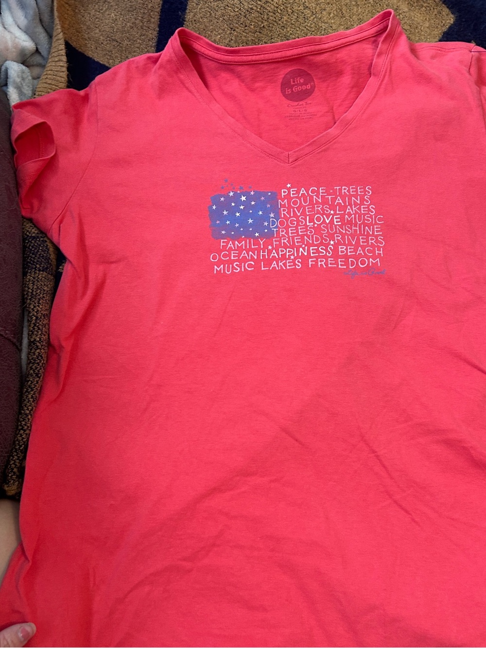 Life Is Good Coral V-Neck Tee with Blue & White Flag Graphic